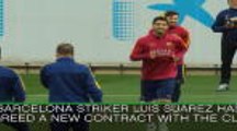 Suarez agrees new Barca deal