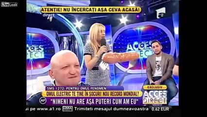 LiveLeak.com - Electrical Tricks of Biba Struja the Battery Man