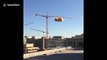 Activists unfurl anti-Donald Trump RESIST banner from crane in Washington DC