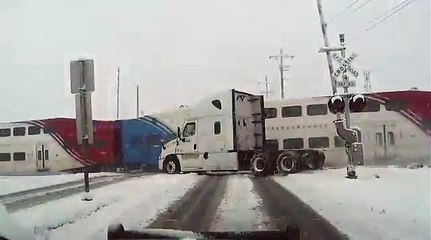 Passenger train crashes into FedEx truck - splits it in half