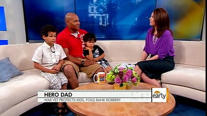 Hero dad takes down bank robber