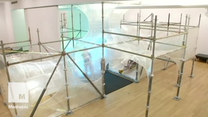 Artist constructs massive playground using only sticky tape and scaffolding