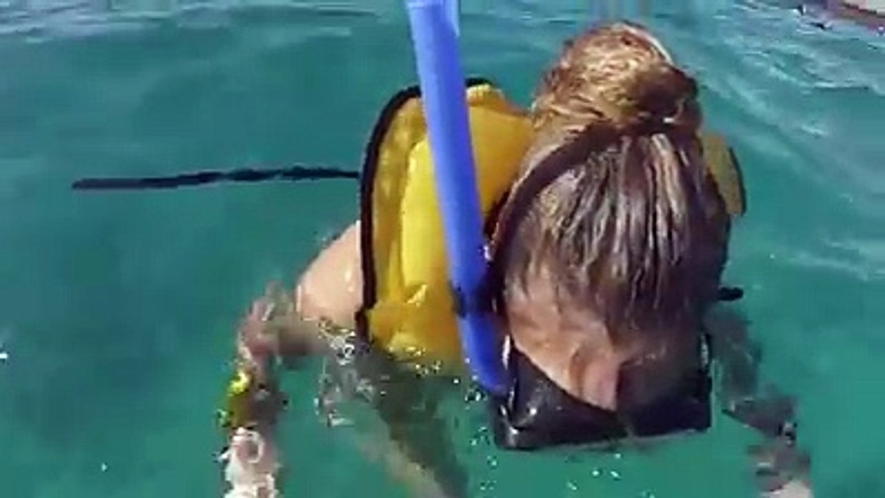Swimming with stingrays in Cozumel, Mexico