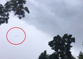 UFO Shoots Past Camera During Thunderstorm