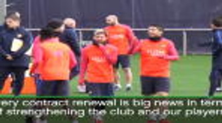 Enrique happy with Suarez renewal but quiet on Messi's