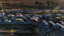 Hundreds leave Aleppo as evacuation resumes