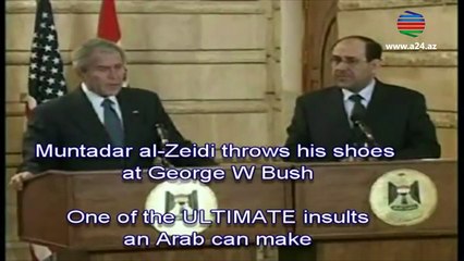 Jurnalist Corc Buşa ayaqqabı atdı