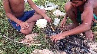 Two Amazing Boys Catching A Big Water Snake Bare Hand While Eating Grilled Fish