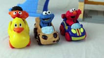 Sesame Street Racers at Bert and Ernie Garage with Cookie Monster and Elmo Racing a Disney Cars Toy
