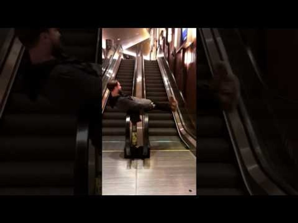 Man Finds an Innovative Use for Parallel Escalators