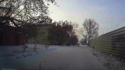 Man Rescues Kitten From Snowy Street