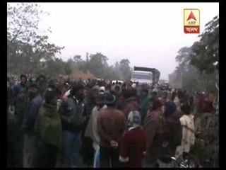 Tribal organisation's road blockade at North Dinajpur  to protest violence in Assam