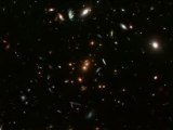 NASA - Hubble Zoom on distant galaxy cluster