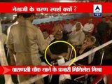 Police officer touches feet of Congress leader Pramod Tiwari