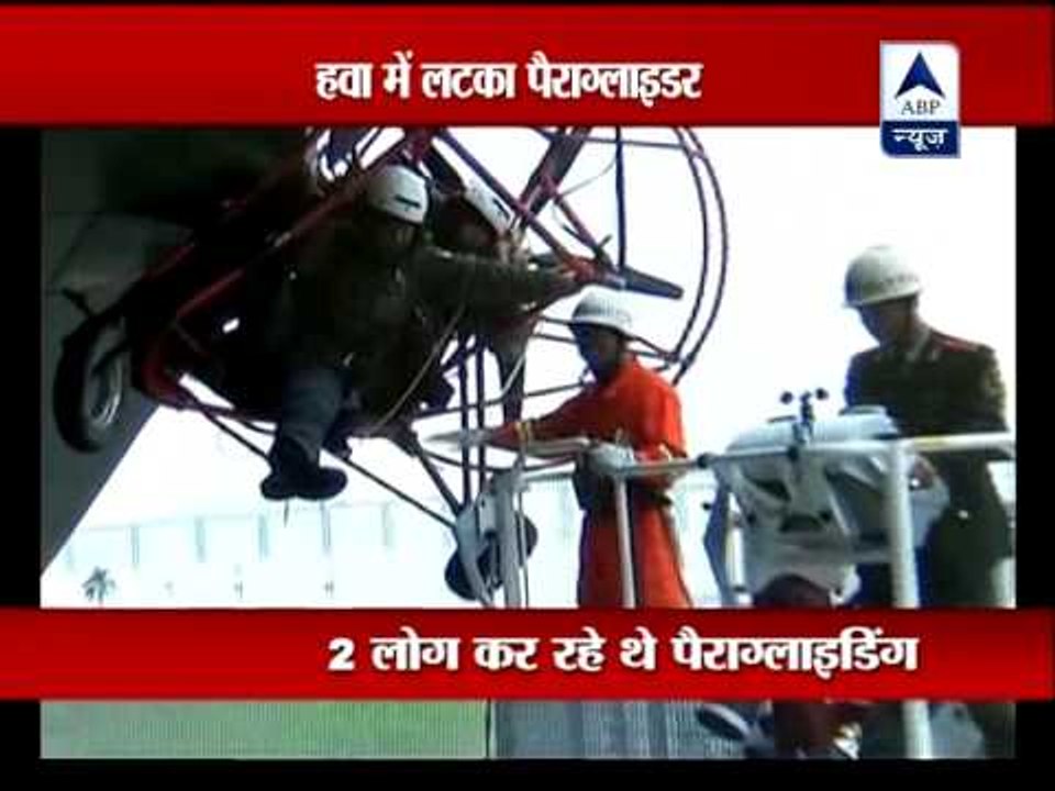 Watch how paraglider gets stuck in a building, is safe