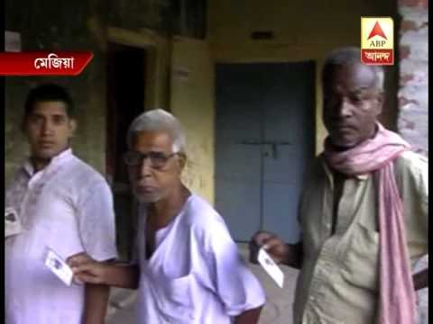 First phase of Panchayat polls underway: voters waiting in booth of Mejia in Bankura
