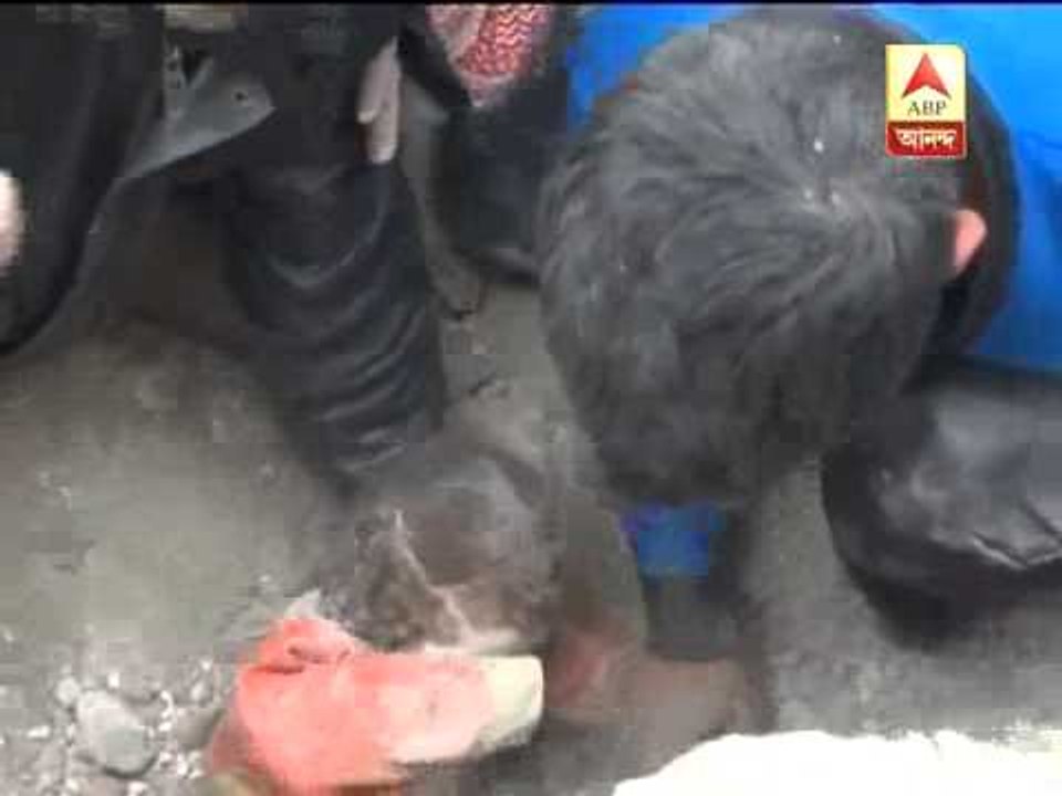 A helpless baby plucked alive from debris in Syria.Baby got into rubbles due to clashes in Syria