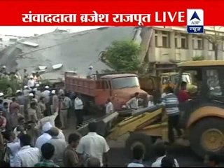 Part of hospital building collapses, many trapped