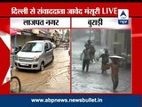 Rains flood Delhi roads and streets