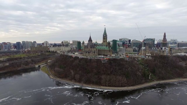 Drone Parliament Buildings from Ottawa River-0axgJAvDgWU