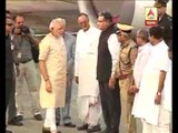 PM arrives at  calcutta airport, being received by Amit Mitra, state bjp leaders.