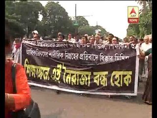 Calcutta University Teachers rally to protest attack on them by TMCP