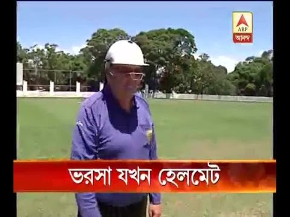 umpire with helmet