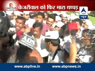 Kejriwal slapped again , reached Rajghat and sat on dharna