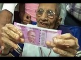 PM Modi's mother Heeraben exchanges demonetised currency worth Rs 4,500 in bank