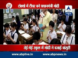 PM Modi turns teacher in Tokyo l plays flute