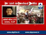 AAP workers toss currency notes, suspended