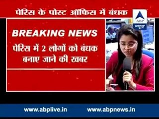 Unidentified gunmen hold two hostage in French post office: police