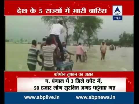 Cyclone Komen hits B'desh coast; heavy rains in Bengal, Odisha