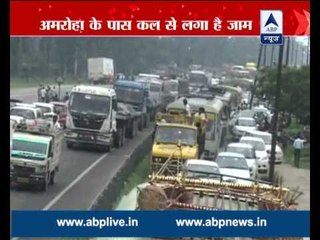 30 km long jam on National Highway 24 brings vehicles to standstill since Thursday night