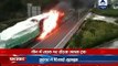 Truck in flames dashes out of tunnel in China