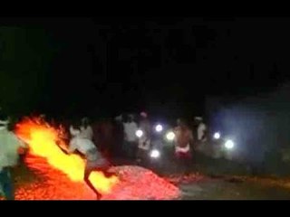 Karnataka: Biravalli residents play Holi with fire