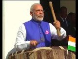 PM Narendra Modi tries his hand at beating drums with Tanzania President John Magufuli