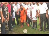 Baba Ramdev promotes football for PM Narendra Modi’s Swachh Bharat Abhiyan
