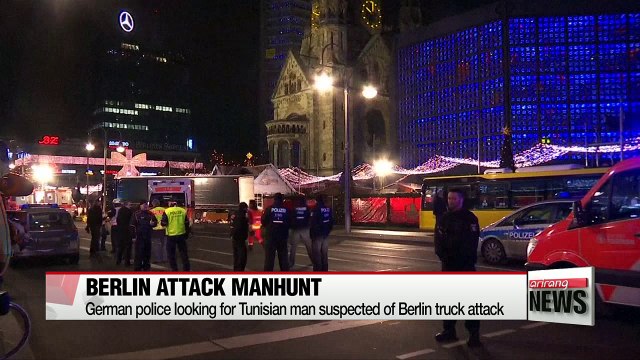 German police hunt Tunisian asylum-seeker over Christmas market attack