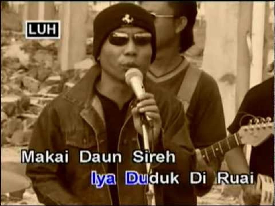Musang Bejanggut Tuai Keladi - Paul Erica
