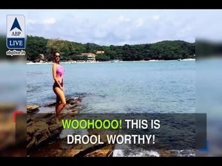 In Graphics: Rochelle sizzles in bikini while holidaying with her boyfriend