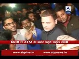 Congress VP Rahul Gandhi meets people outside ATM in Delhi