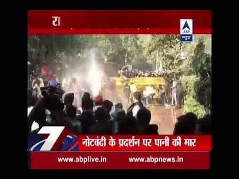 BJP workers faced water canons while they protested against Arvind Kejriwal