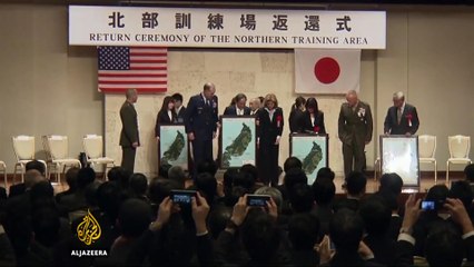 US returns land on Okinawa island to Japan