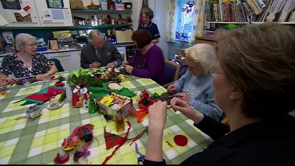 Charles stabs his finger making Christmas decorations