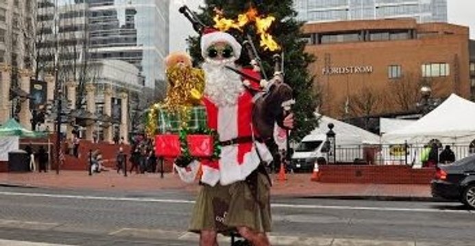 It Just Isn't Christmas Until You See a Flaming Bagpipe-Playing Santa on a Unicycle