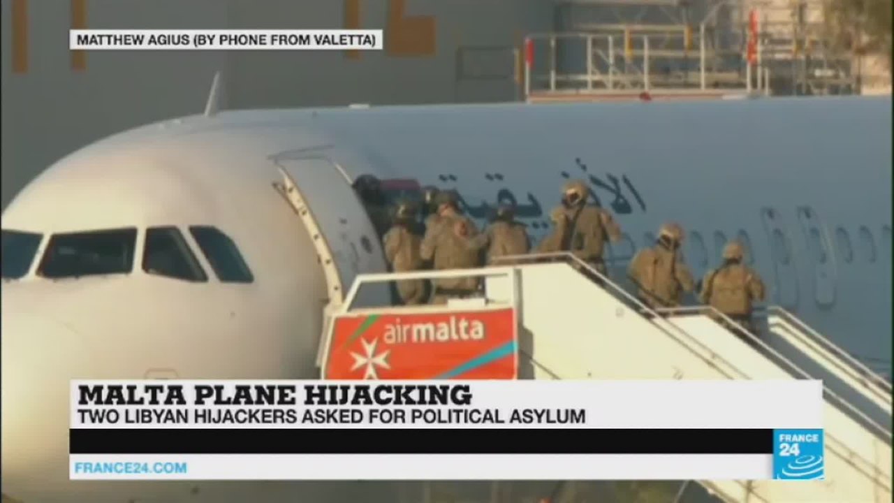 Two Libyan hijackers surrender
