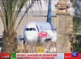 Hijackers of Libyan plane release hostages and surrender