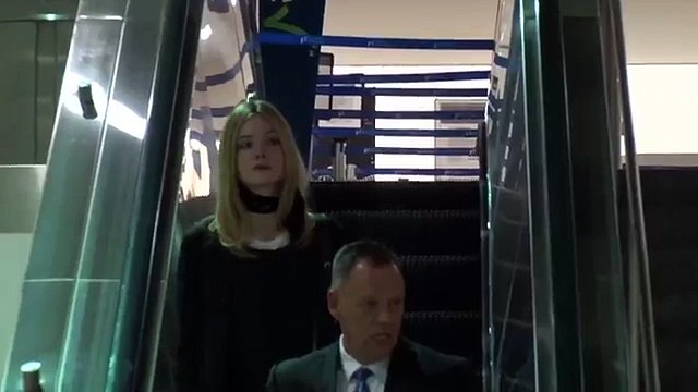 Elle Fanning Flashes The Photographer... With A Smile