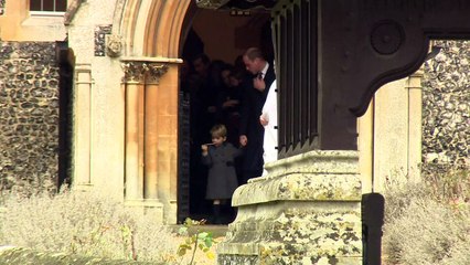 Prince George and Princess Charlotte hold candy canes